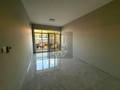 New 2BR apartment in Al Rawda 3 for rent: spacious layout, hall, 3 bathrooms, balcony, central AC, prime location near Ammar Street. Rent 45K, 4–6 pay
