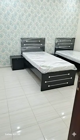 Brand new single bed with mattress