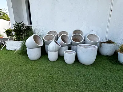 Set of assorted white outdoor plant pots — mixed sizes (12 pieces)
