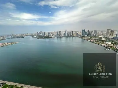 With a sea view, a 3-bedroom apartment with a living room is available for annual rent in Al Majaz.
