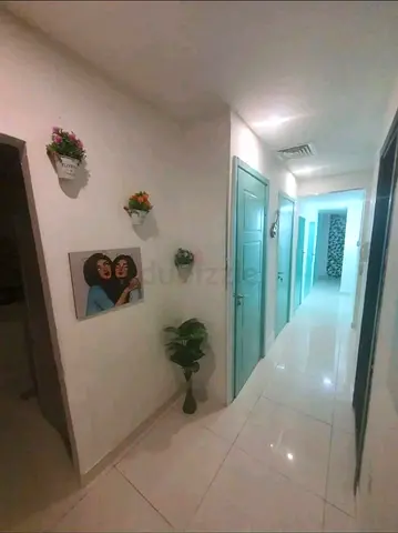 Partition for Girls in Silicon Oasis Ready to move near Souq extra Mall closed up to ceiling