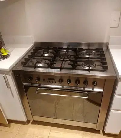 Stainless Steel 5-Burner Gas Range with Electric Oven - Good Condition