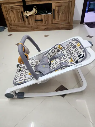 Baby rocker/seat for babies upto 18 months,  elephant print - great condition. Minimal use 1-2 month