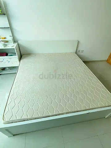 White wooden bed frame with mattress - good condition