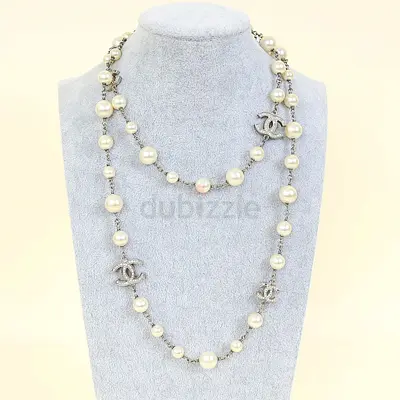 Authentic Chanel Ivory CC Crystal Pearl Long Necklace