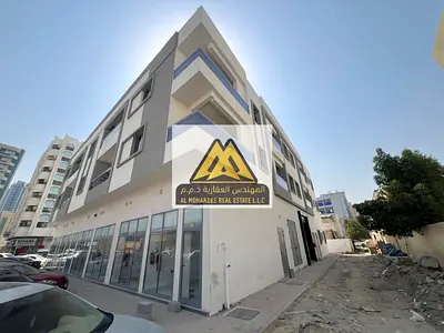 بناية سكنية تجارية للبيع في النخيل 1 عجمان أرضي + 2 دخل 1,150,000 درهم بسعر 12,500,000