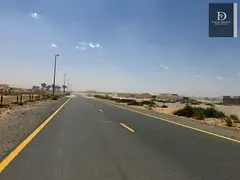 For sale in Sharjah Party area Residential plot / area 5,489 feet A very special location / on two s