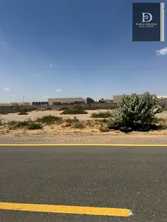 For sale in Sharjah Party area Residential plot / area 5,489 feet A very special location / on two s