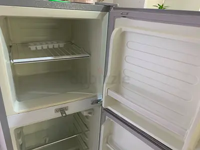 Compact double-door fridge with freezer - good condition