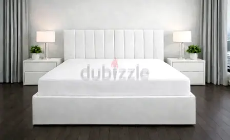 White Upholstered Platform Bed with Headboard and Storage Base