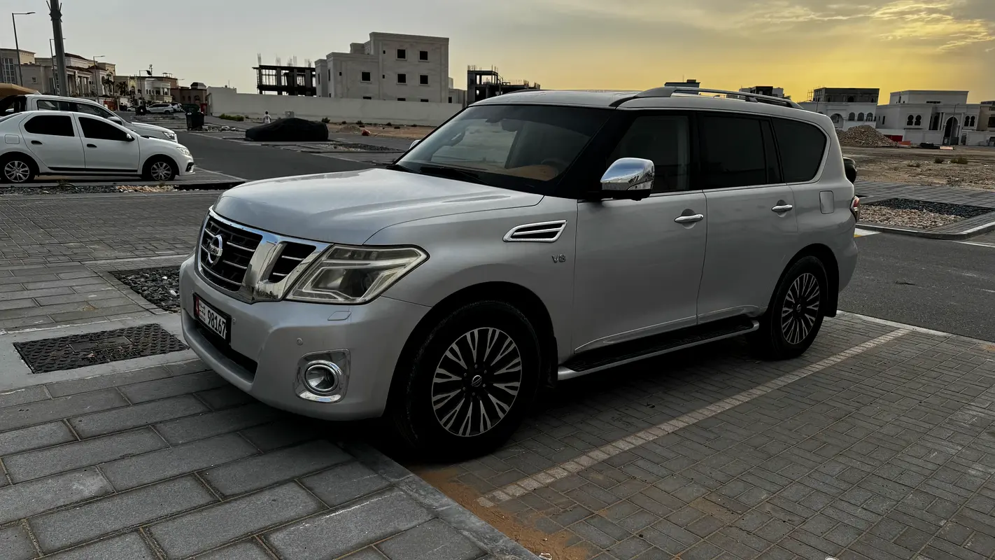 Nissan Patrol 2014 — photo 1 of 13