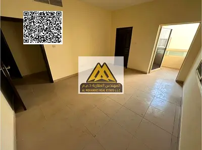 A spacious 3-bedroom apartment with a living room for annual rent in Al Nuaimiya 2 – Ajman, featuring a large layout and a well-designed interior that