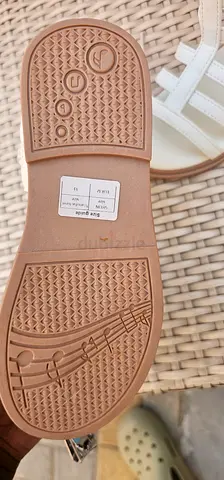 Pair of brown womens flat sandals - lightly used