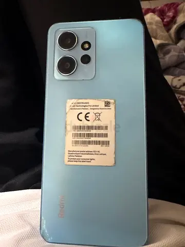 Redmi smartphone - light blue, used