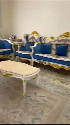 Two Sets of sofas with tables