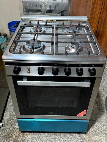 Stainless Steel 4-Burner Gas Cooker with Oven - Good Condition