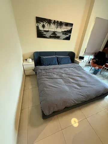 King upholstered bed frame without mattress