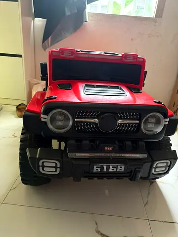 Red Ride-On Toy Truck for Kids - Battery Powered Style