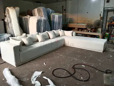 Large L-shaped White Fabric Sectional Sofa with Multiple Cushions