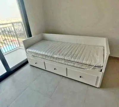 IKEA Hamnes Day bed with 3 storage drawers underneath and with 2 IKEA mattresses