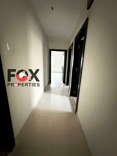1 bedroom hall apartment for rent in Al Rawda 2 Ajman balcony 2 baths central AC spacious 4 or 6 pay