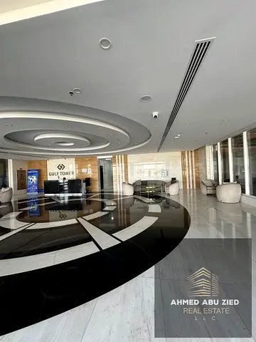 2BR + living room for annual rent in Golf Tower – prime location on Sheikh Mohammed Bin Zayed Road, free parking, balcony, great price