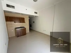 Studio in Smart Tower for annual rent, featuring a gym, pool, and spacious layout. Prime location ne