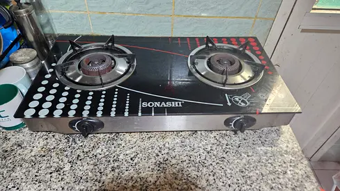 Gas stove with cylinder