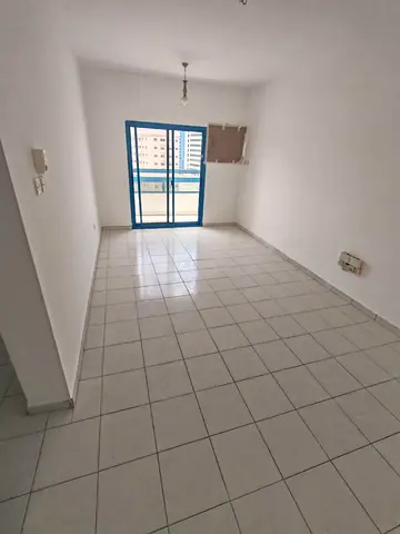 For annual rent in Sharjah – Umm Tarafa area, a well-maintained apartment consisting of two bedrooms and a living room with a practical layout suitabl
