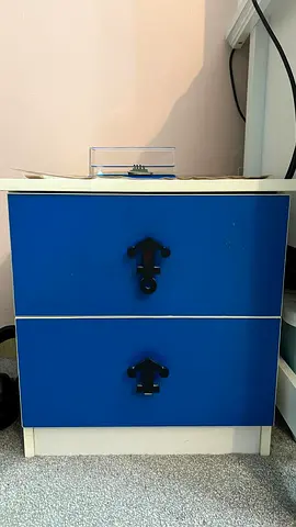 Blue Bed Set:
Modern blue bed with handy under-bed storage and a matching night table