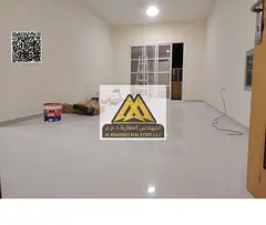 One-bedroom apartment with living room in Al Rawda 2, Ajman, balcony with open view, family-only bui