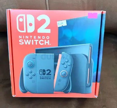Nintendo Switch 2 brand new  (Neon Coral/Blue) Bundle - Boxed,