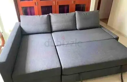 IKEA L shap Sofa store cum bed you can fix the storage lift or Right any side