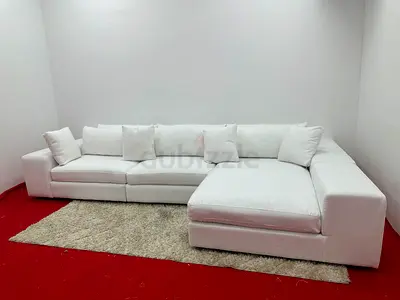 Same like new condition eichholtz brand white color lshape sofa