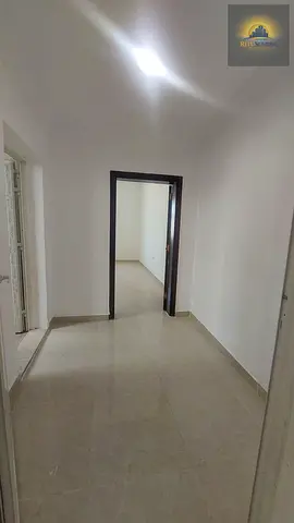 1 bedrooms hall with 2 bathrooms terrace opposite to shabiya 12 with reserved parking