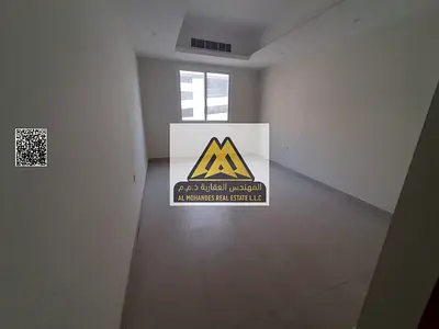 First-tenant apartment in Al Hamidiya 1, Ajman, one-bedroom and living room (master), open view of main street, central AC, AED 38,000, 4 or 6 install