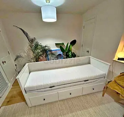 IKEA Hamnes Day bed with 3 storage drawers underneath and with 2 IKEA mattresses