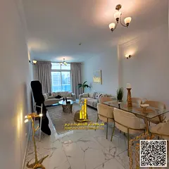 With a sea view, a furnished two-bedroom apartment with a living room is for monthly rent in Ajman 