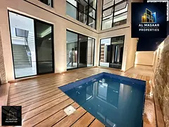Luxury villa for sale in Al Bahia, elegant design and ideal spaces, at a special price including reg
