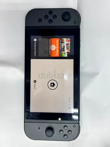 Nintendo Switch Console with Gray Joy-Con - Good Working Condition