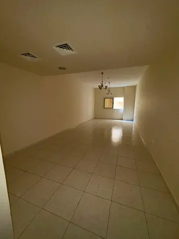 Two bedrooms and a living room for rent in Al Majaz 3, near Al Majaz Park. Includes a maid's room,