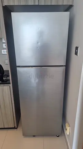 Samsung Silver double-door refrigerator – good working condition, minor dents