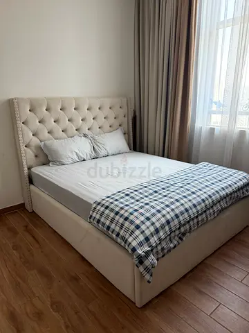 Queen size upholstered bed with tufted headboard - light beige