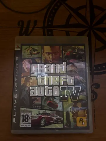 Grand Theft Auto IV (PlayStation 3) - with all papers ,map , like new disc and DVD Case