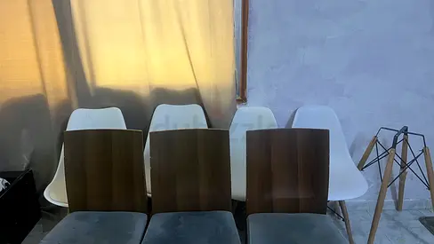 Set of 4 white chairs and 3 wood chairs
