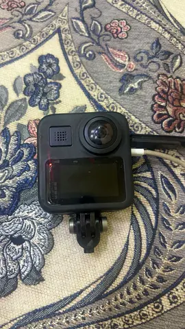 GoPro-style Action Camera (used) with Mount and Charging Cable