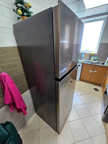 Stainless Steel Top-Freezer Refrigerator — Good Condition