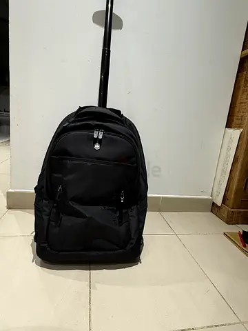 Black wheeled backpack with telescopic handle - excellent  condition