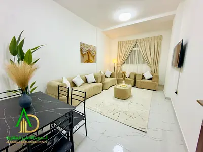 Two bedrooms and a living room, furnished with high-end furniture.