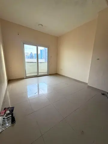 One bedroom and hall in Al Majaz 2, central AC, 32,000 AED, 4 cheques, parking available, prime loc